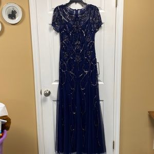 Absolutely gorgeous dress! Deep navy blue with great beading